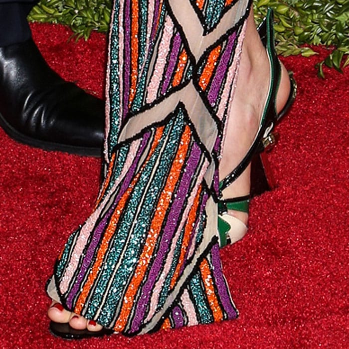 Thalia's Prada 'Hot Rod' sandals in green and ivory
