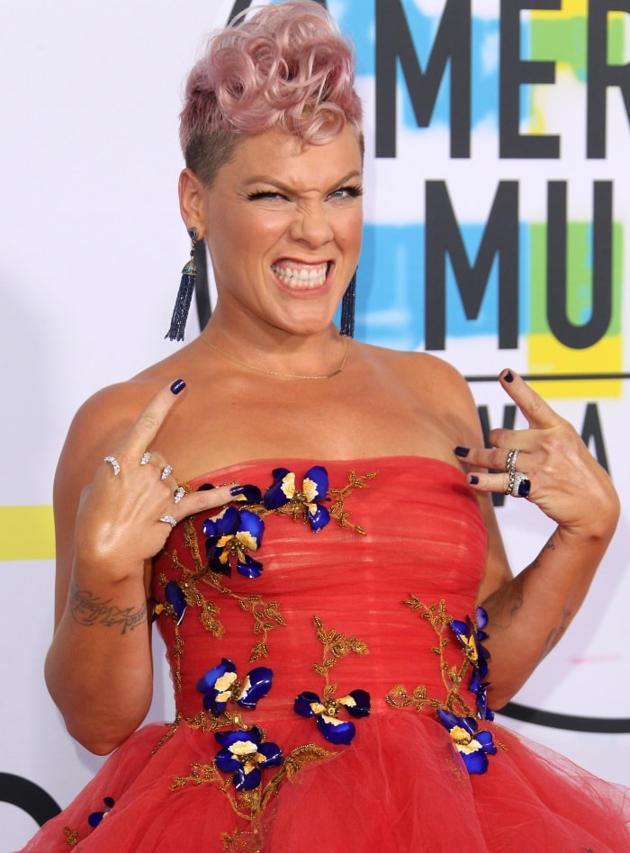 Pink wearing an assortment of rings from Le Vian and Spallanzani, as well as gorgeous blue tassel earrings from Narcisa Pheres at the 2017 American Music Awards