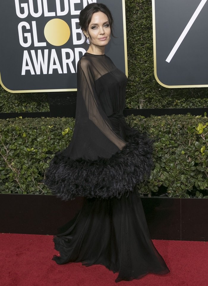 Angelina Jolie wearing a ruched chiffon Atelier Versace gown at the 2018 Golden Globe Awards held at the Beverly Hilton Hotel in Beverly Hills, California, on January 7, 2018