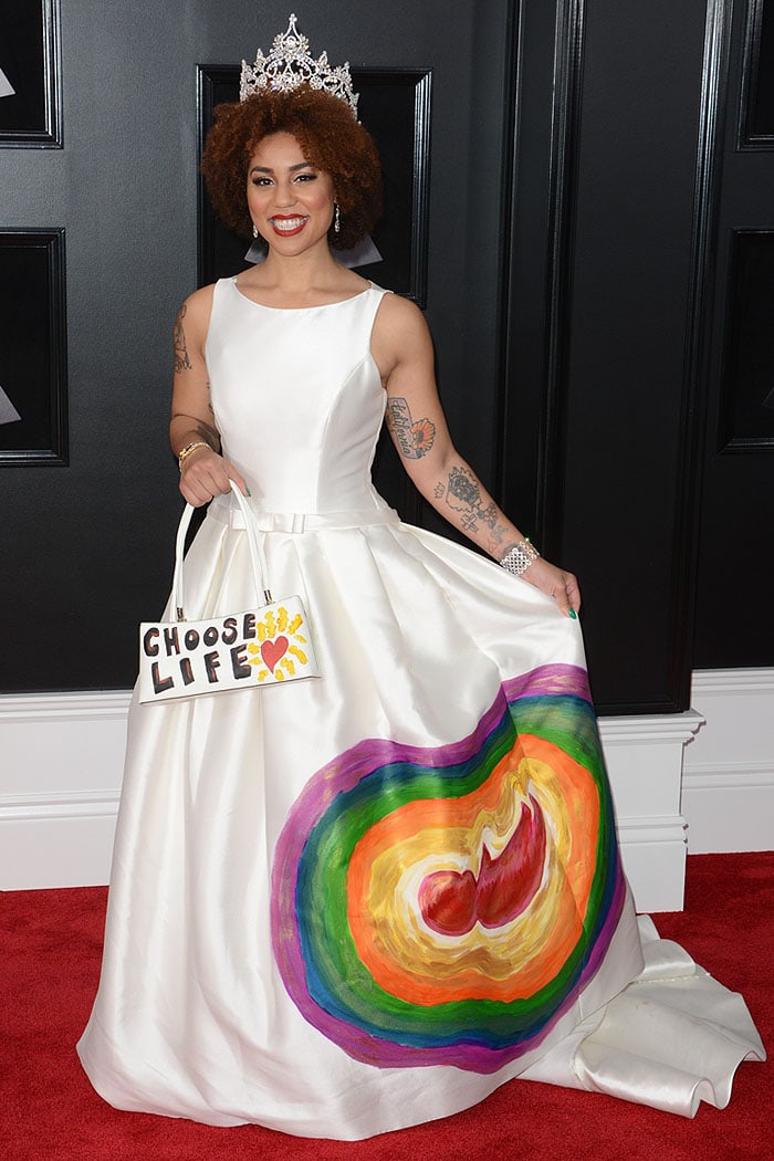Joy Villa herself hand-painted her Pronovias sleeveless ball gown with the fetus portrait based on the sonogram of her own daughter