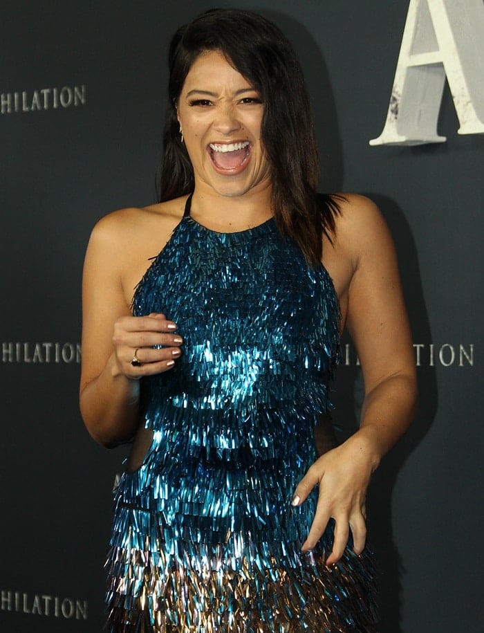 Gina Rodriguez <em>in a slinky turquoise ombré beaded halter gown from Cristina Ottaviano’s Fall 2017 collection